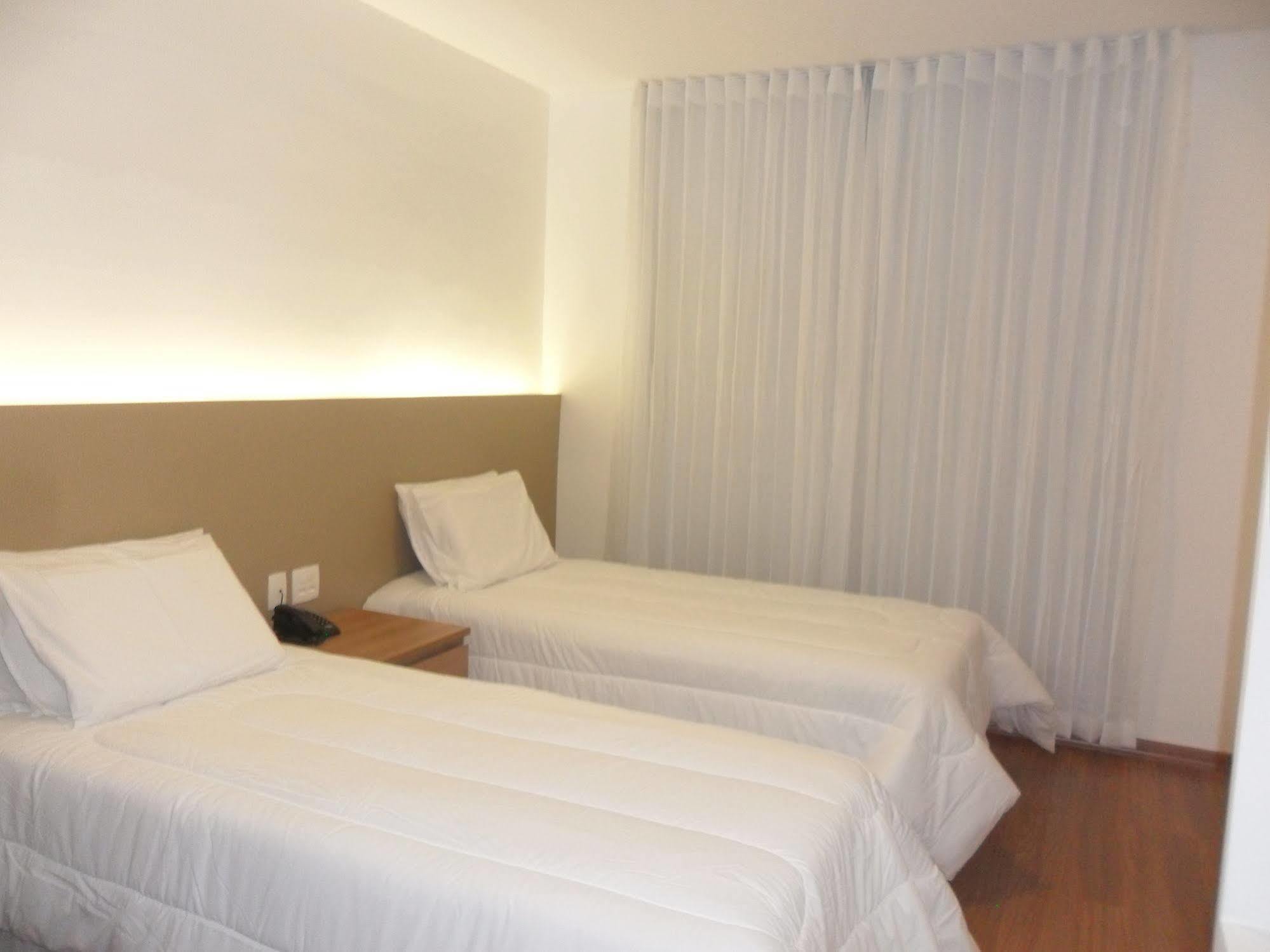 Lord Hotel Aeroporto Confins Vespasiano Bagian luar foto